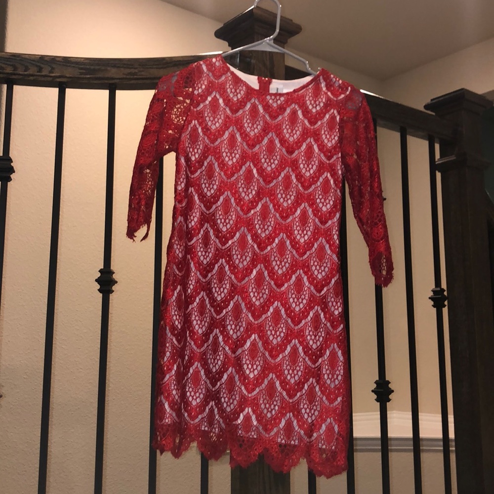 Red lace dress with white under